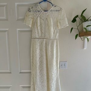 Wedding Dress-needs to be cleaned. Size 6 with alterations.